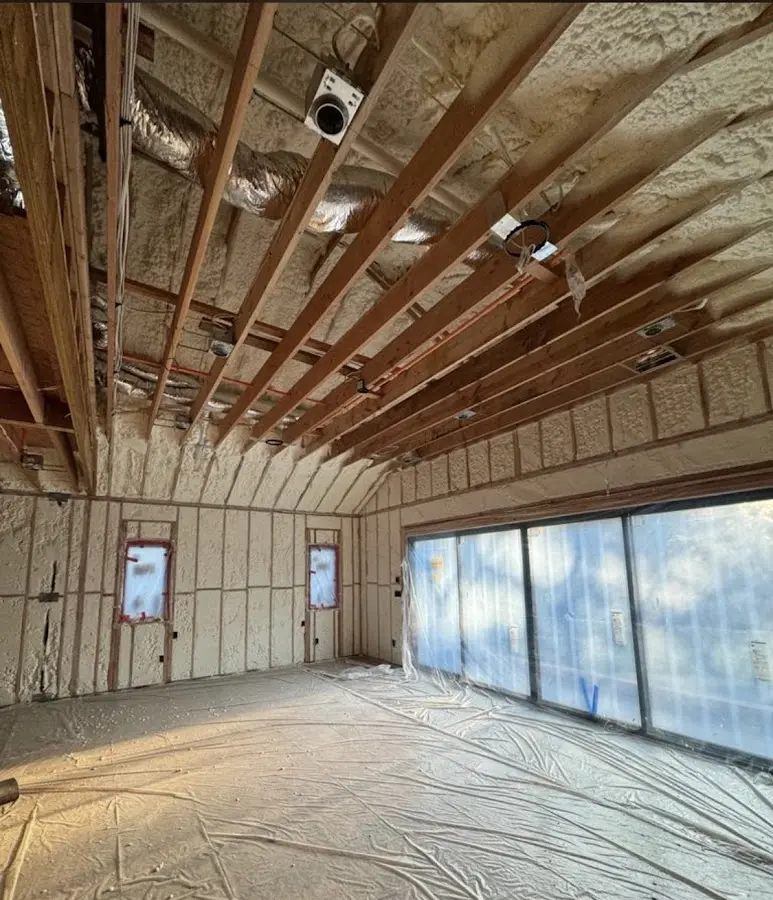 Interior walls and ceiling insulated with spray foam during new construction in Edgewood